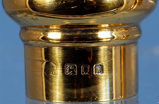 An Edwardian silver mounted glass scent bottle & a pair of scent bottles.